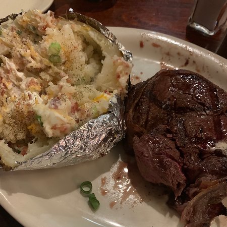 The Butcher Shop Steakhouse signature dishes Hickory-Charcoal Grilled Steaks, Prime Rib, Seafood